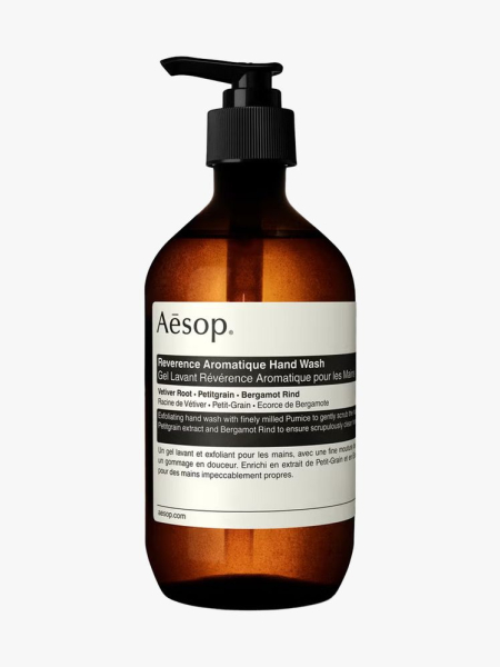 Aesop Reverence Aromatique Hand Wash in branded component on a light gray background
